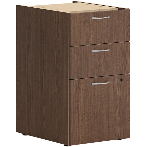 A sepia walnut HON file cabinet with 2 box drawers and 1 file drawer.