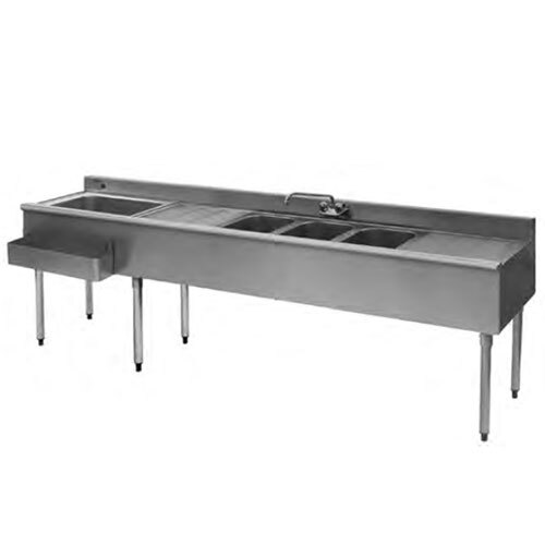 A stainless steel Eagle Group underbar sink with three sinks, two drainboards, and a faucet.