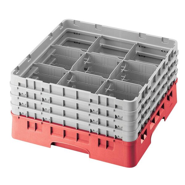 A red and grey plastic Cambro glass rack with compartments.
