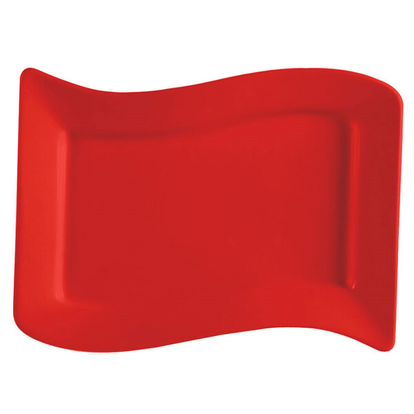 A red rectangular stoneware platter with a curved edge.