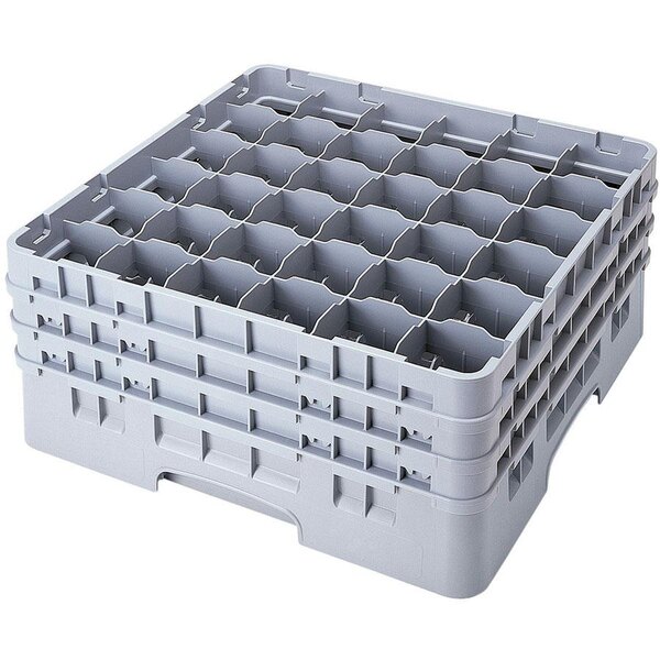 A stack of plastic Cambro glass racks with 36 compartments.