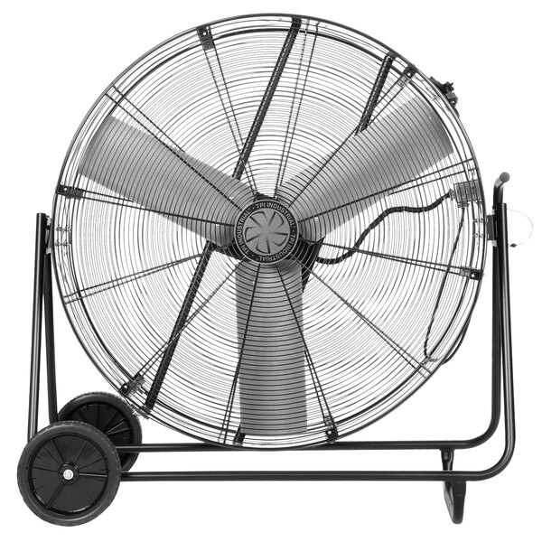 A large black TPI industrial fan on wheels.