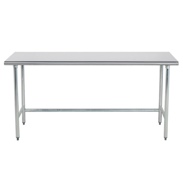 A stainless steel Advance Tabco work table with a metal base.