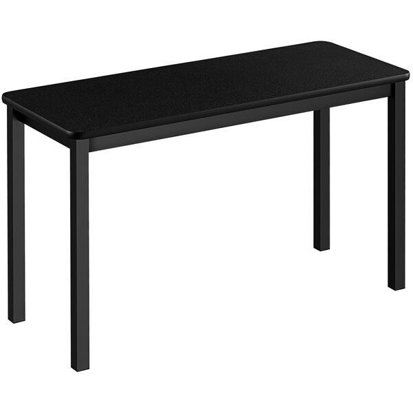 A black rectangular Correll lab table with legs and a black top.