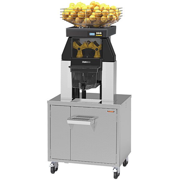 A Zummo commercial juicer with a basket of lemons on top.