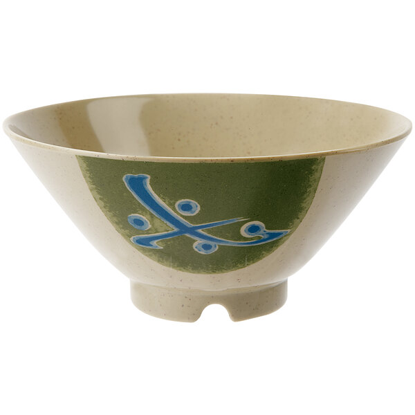 A white melamine bowl with a blue and green Japanese design on it.