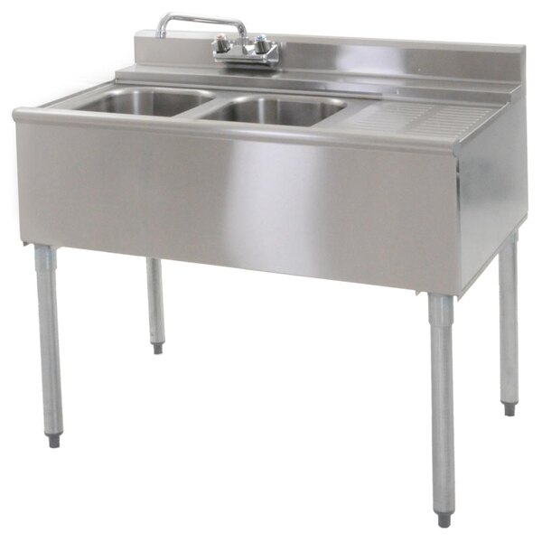 A stainless steel Eagle Group underbar sink with two compartments and right drainboard.