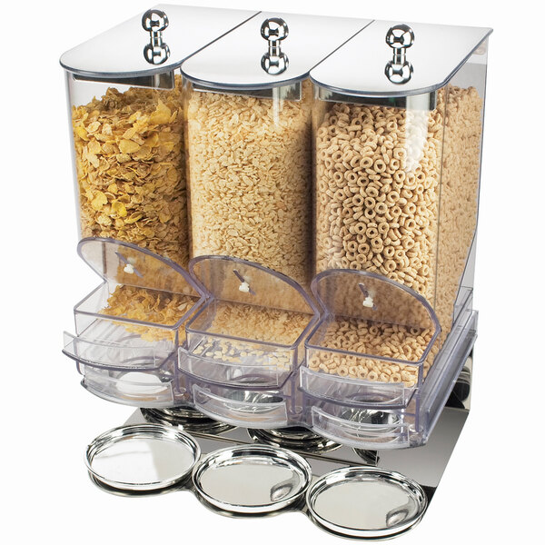 A Cal-Mil triple canister cereal dispenser filled with cereal.