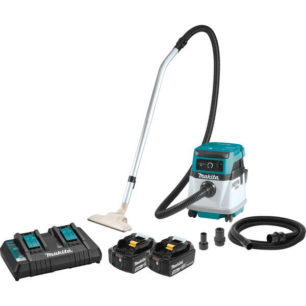 A Makita wet/dry vacuum with a black and blue battery box and two white batteries.