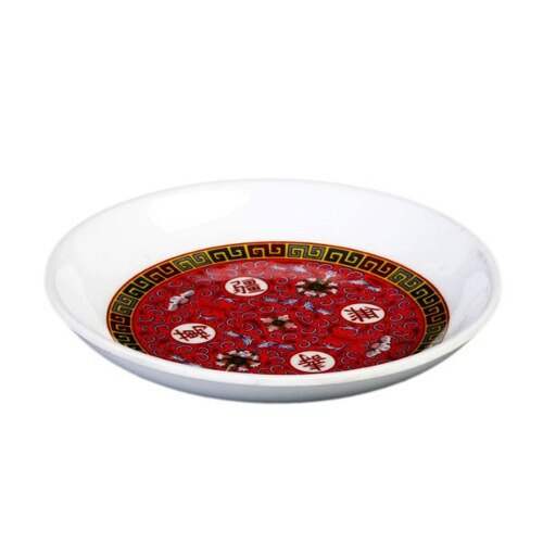 A white bowl with red and yellow Longevity designs.