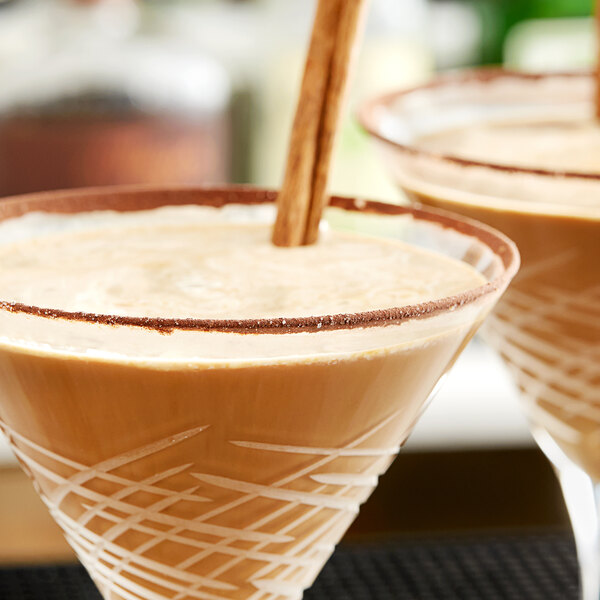 A close-up of a brown drink rimmed with King Floyd's Chocolate Cinnamon Rimming Sugar.