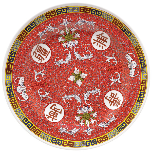 A white melamine plate with red and yellow Chinese symbols.