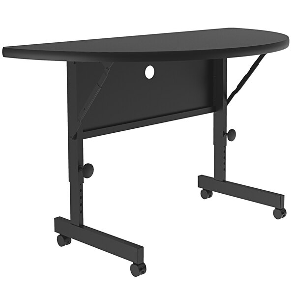 A black Correll seminar table with wheels.