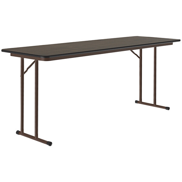 A rectangular Correll seminar table with a black top and off-set black legs.