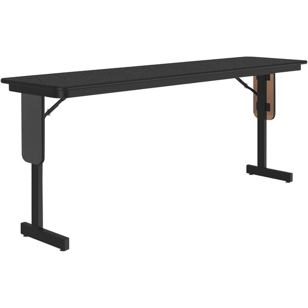 A black rectangular Correll seminar table with black panel legs.