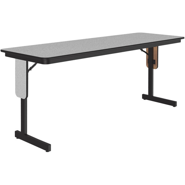 A Correll rectangular seminar table with black panel legs and a gray top.