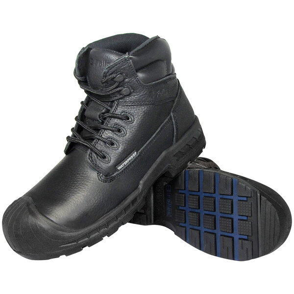 A pair of black Genuine Grip 6000 Vulcan safety boots with blue soles.