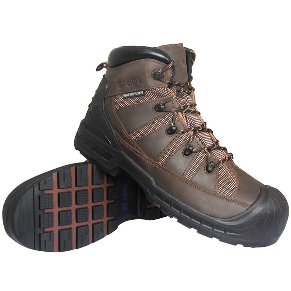 A brown Genuine Grip Trekker safety boot with black laces and a black sole.