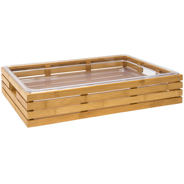 A wooden tray with clear plastic pans inside.