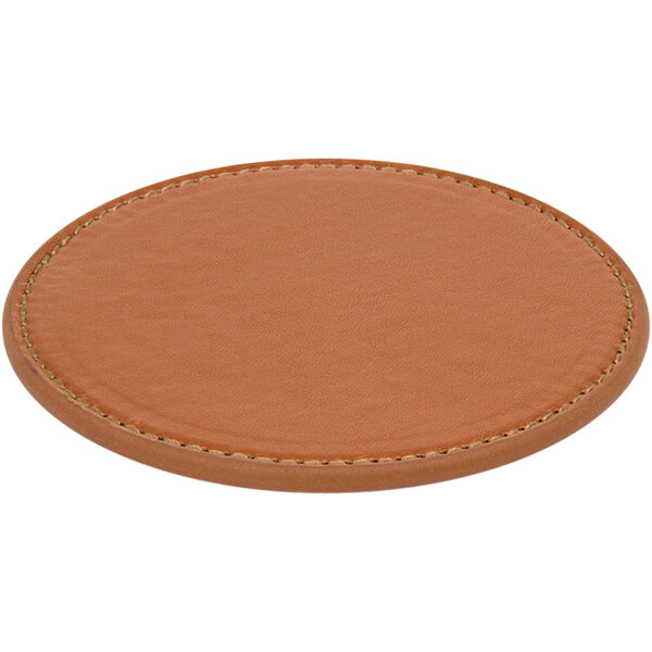 A brown vinyl coaster with stitching on it.