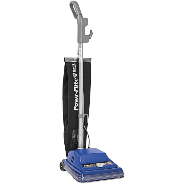 A blue Powr-Flite upright vacuum cleaner with a black shakeout bag.