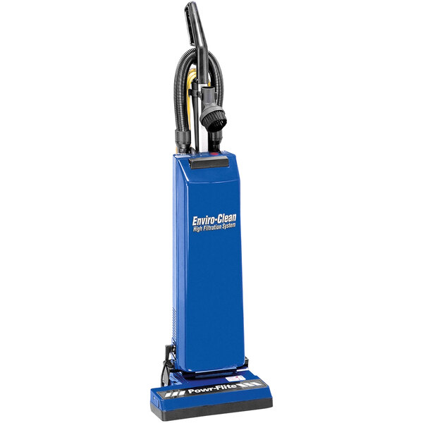A blue Powr-Flite upright vacuum cleaner with black attachments.