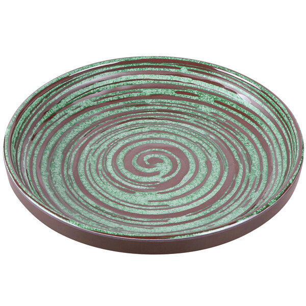 A brown and green Elite Global Solutions melamine plate with a swirl design.