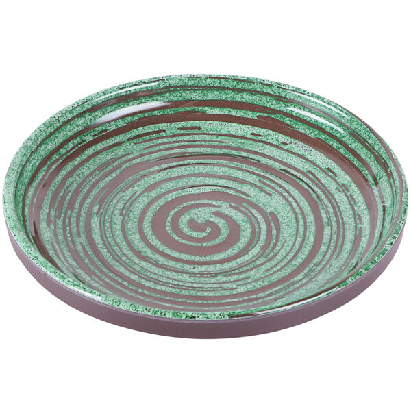 An Elite Global Solutions Stardust melamine coupe plate with green and brown swirl design.