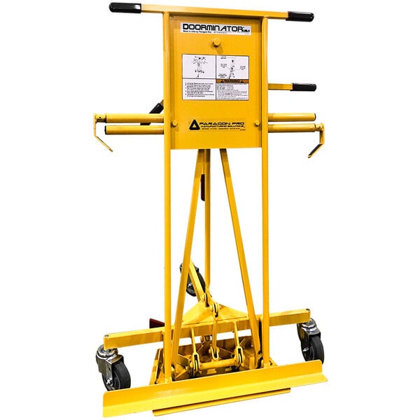 A yellow metal Paragon Pro Manufacturing Solutions Doorminator with wheels and a handle.