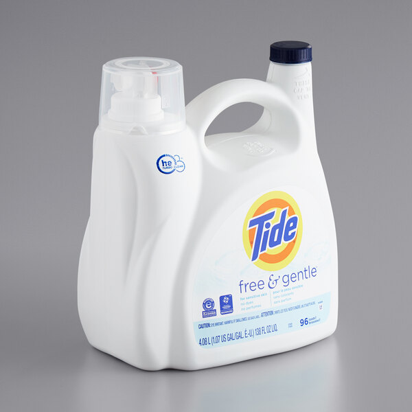 A white plastic container of Tide Free & Gentle Liquid Laundry Detergent with a blue label.