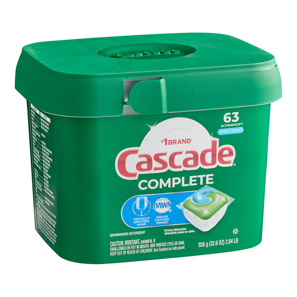 A green container of Cascade Complete dishwasher detergent pods with a white and blue label.