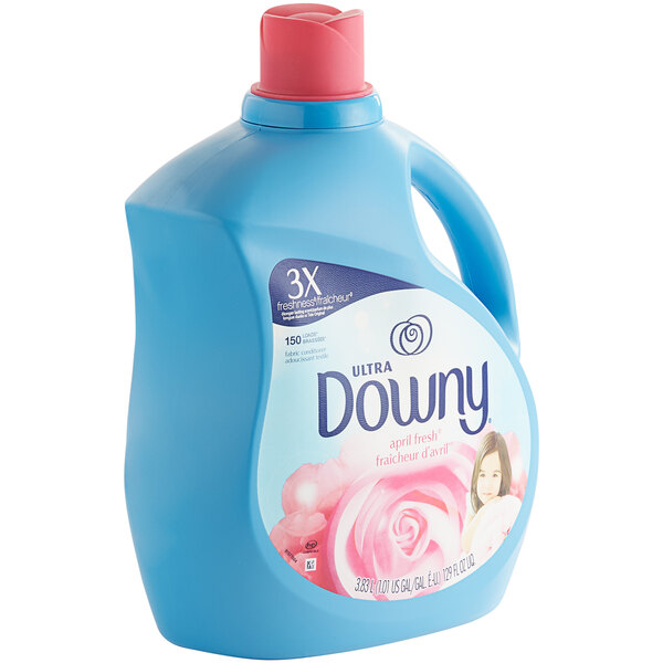 A blue Downy Ultra April Fresh Liquid Fabric Conditioner bottle with a red cap.