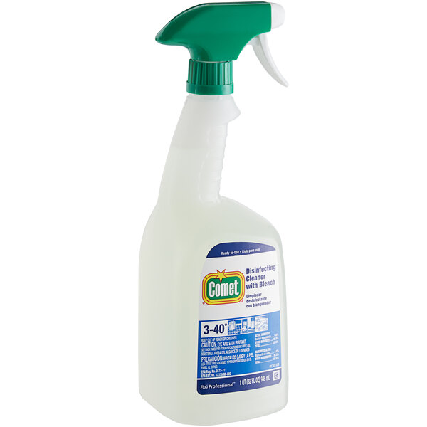 A green and white spray bottle of Comet disinfecting cleaner.