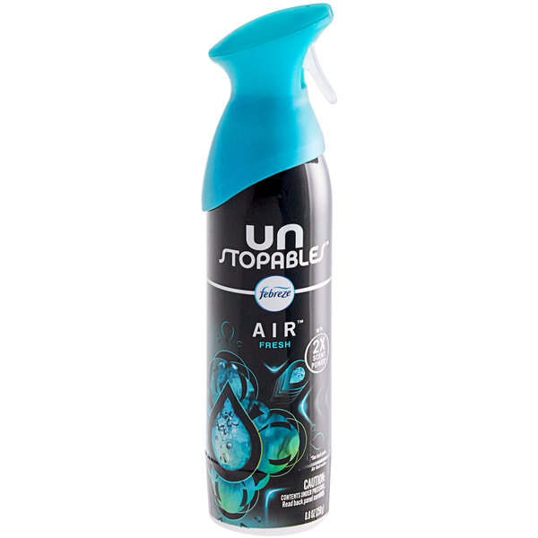 A can of Febreze Unstopables Air Freshener spray in a room.