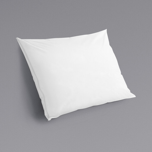 A white CleanRest PRO Max pillow protector on a gray surface.
