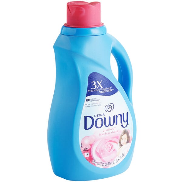 A blue Downy laundry detergent bottle with a label.