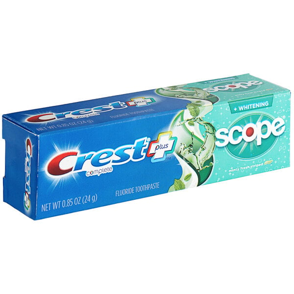 A blue Crest box with white and blue text that reads "Crest Complete Whitening Mint Toothpaste" on a counter.