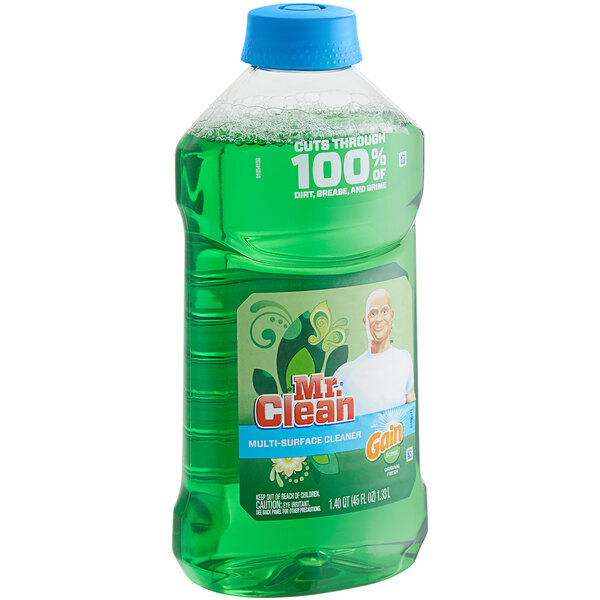 A green bottle of Mr. Clean Multi-Surface Cleaner with a green cap.