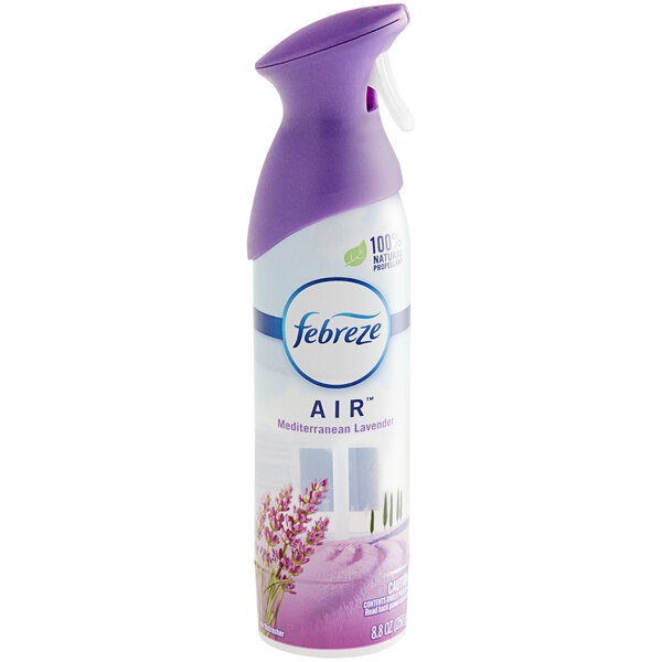 A close-up of a Febreze Mediterranean Lavender scented air freshener spray can with a purple cap.