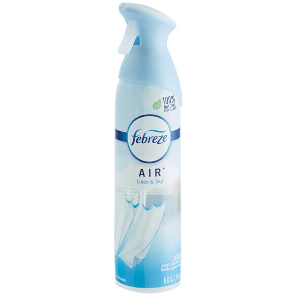 A close up of a Febreze Linen & Sky scented air freshener spray can with a blue cap.