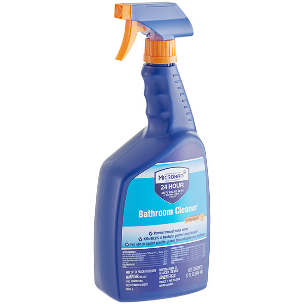 A blue spray bottle of Microban Citrus Scented Bathroom Cleaner with a yellow handle.