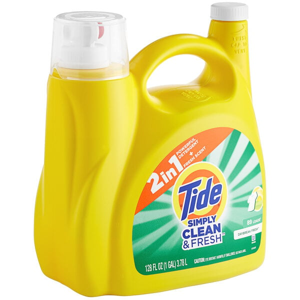 A yellow Tide container of Tide Simply Clean & Fresh Daybreak Fresh Liquid Laundry Detergent.