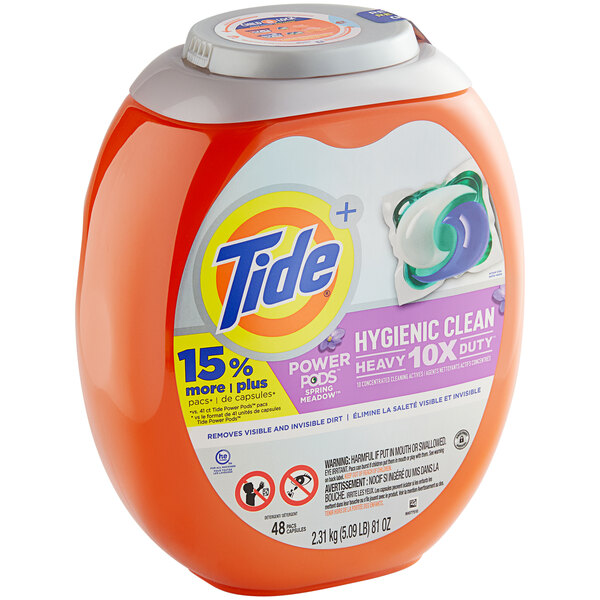 A container of Tide Hygienic Clean Spring Meadow Scent laundry detergent PODS.