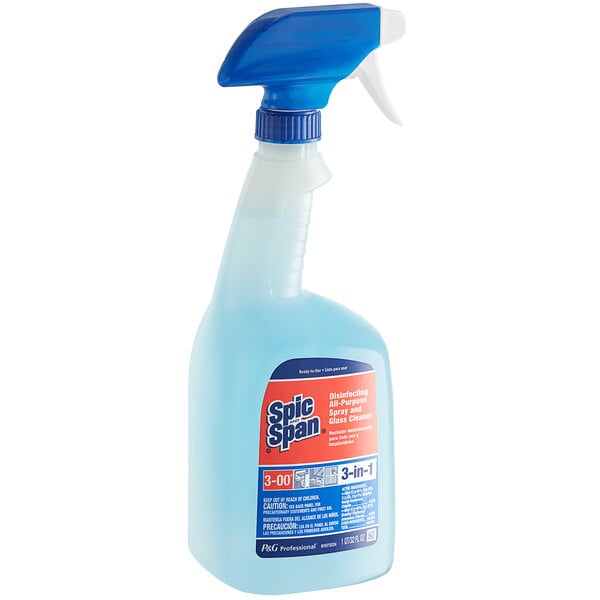 A blue and white Spic and Span spray bottle with a foil seal.