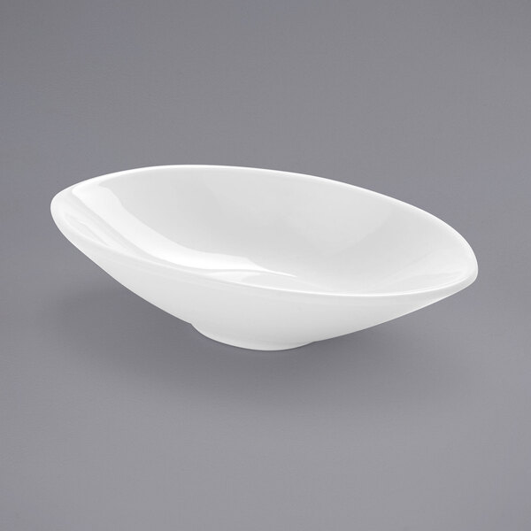 An American Metalcraft white mini melamine bowl with a small rim on a gray surface.