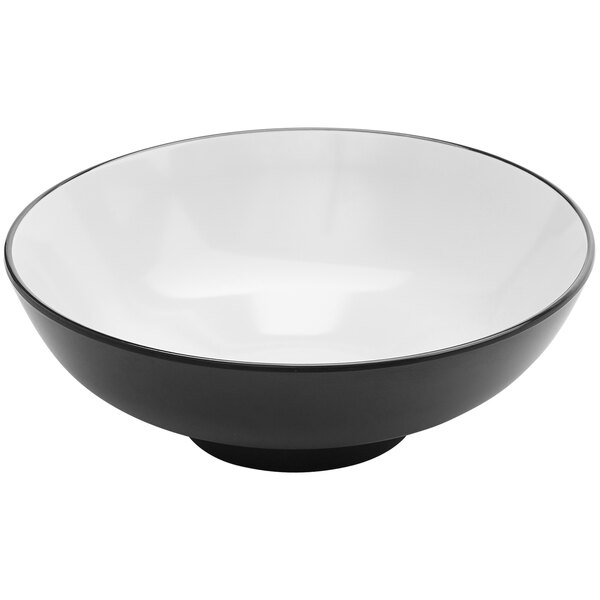 An American Metalcraft black and white melamine noodle bowl with a black rim.