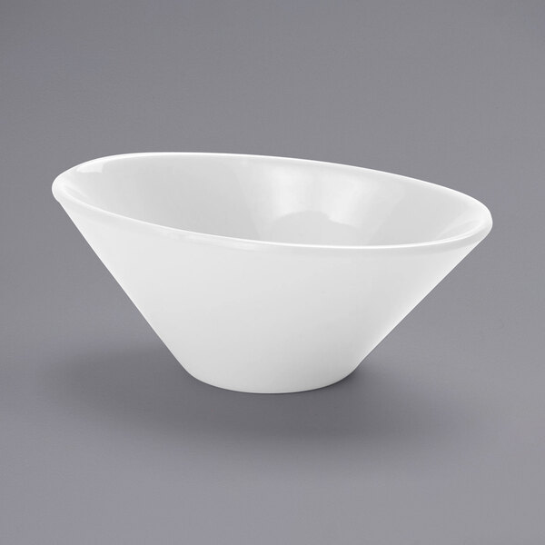 An American Metalcraft white mini melamine bowl on a gray surface.