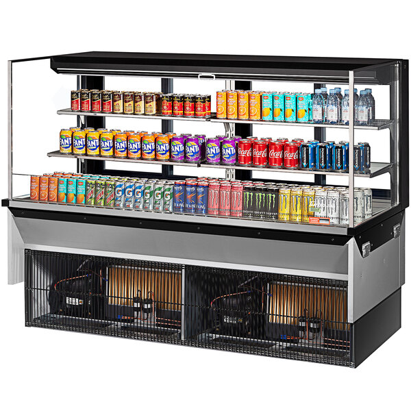 A Turbo Air drop-in refrigerated display case with drinks and beverages on shelves.