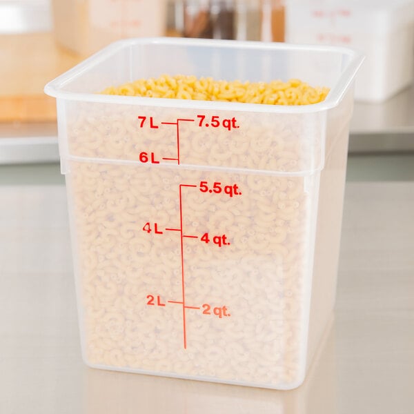 A Cambro translucent square polypropylene food storage container with pasta inside.