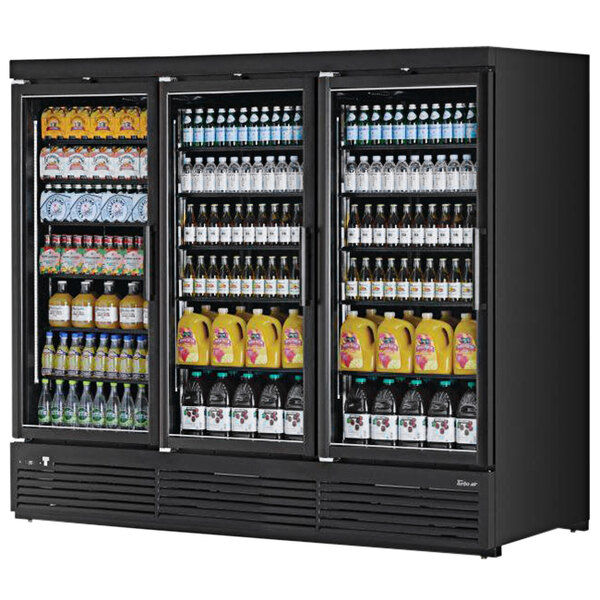 A black Turbo Air refrigerated merchandiser full of beverage bottles.